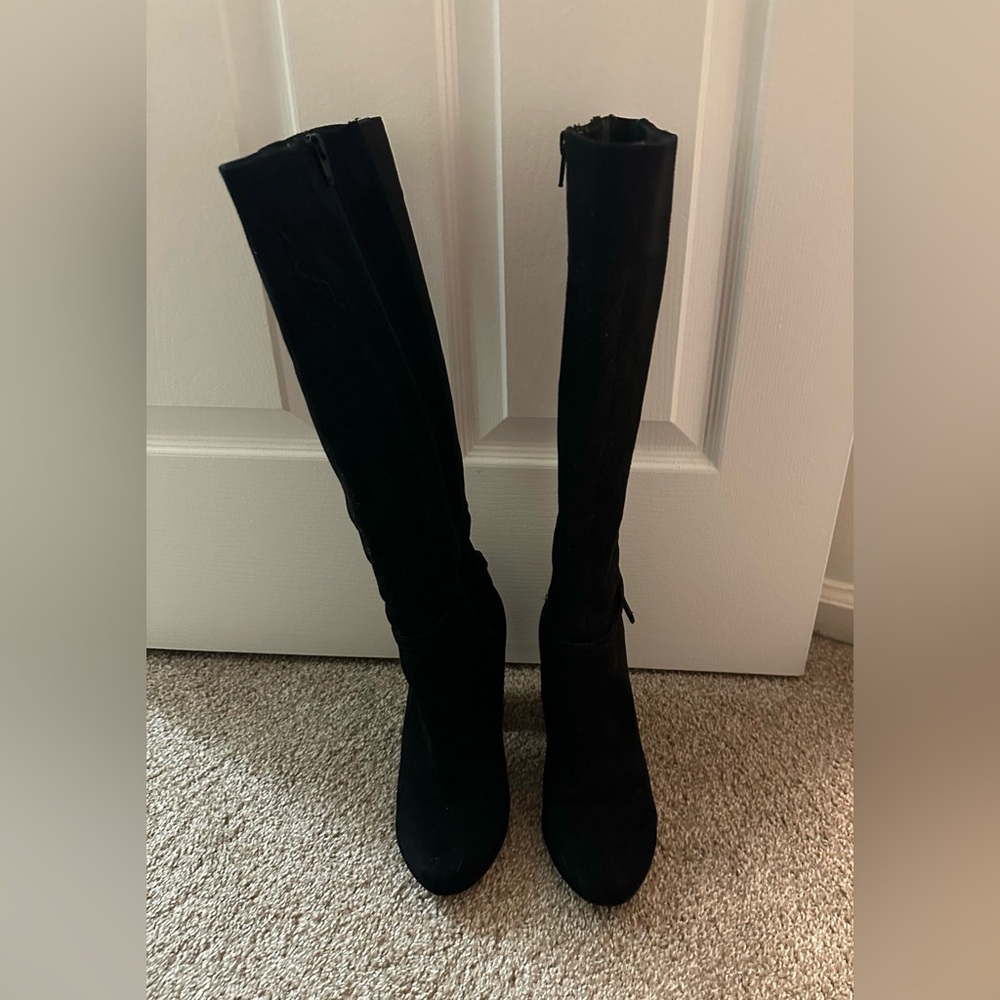 LC Lauren Conrad black tall boots .